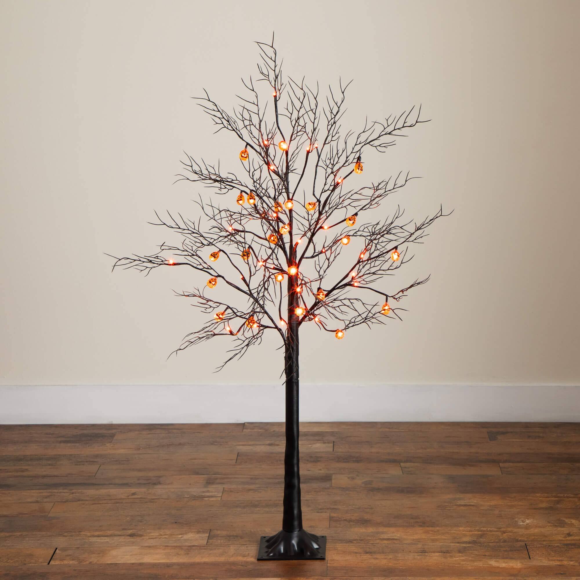 4ft. Pre-Lit Artificial Halloween Black Twig Tree with 24 Orange LED Pumpkin Shaped Lights